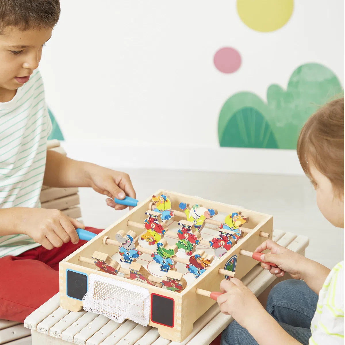 Janod - Mini Tischfußball aus Holz für Kinder - Thema Eishockey - Fördert die Fähigkeit zu tauschen und zu teilen - FSC Produkt - Ab 3 Jahre - J03367