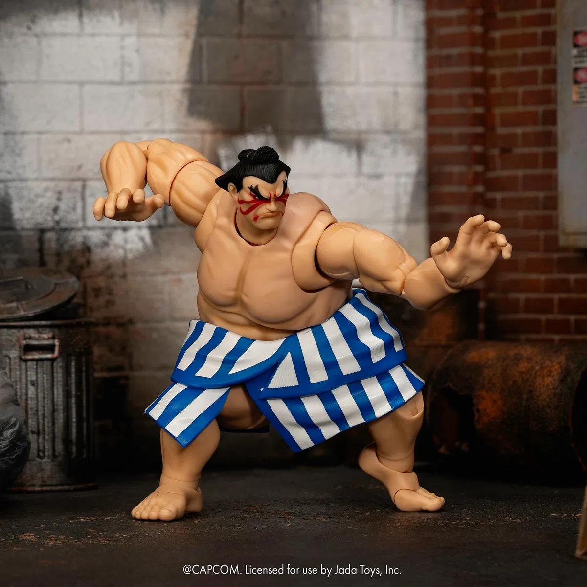 Jada Toys Street Fighter Figur E. Honda (16 cm) - bewegliche Sammel- und Actionfigur aus Street Fighter 2: The Final Challengers, mit alternativem Kopf, Händen und Zubehör, ab 13 Jahre