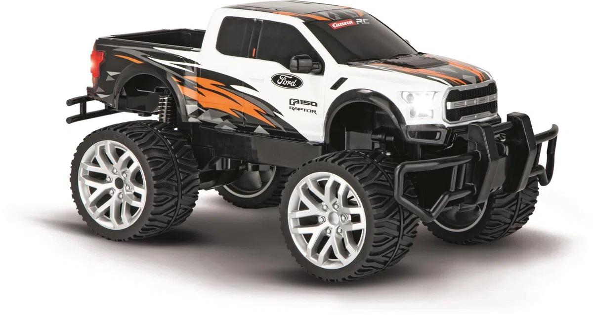 Carrera - 370142042 RC Ford F-150 Raptor I Ferngesteuerter RC Truck I Für Kinder & Erwachsenen I wiederaufladbar Batterie für 40 Minuten Fahrspaß I 18 km/h I Für Anfänger & Profis I 2,4 GHz