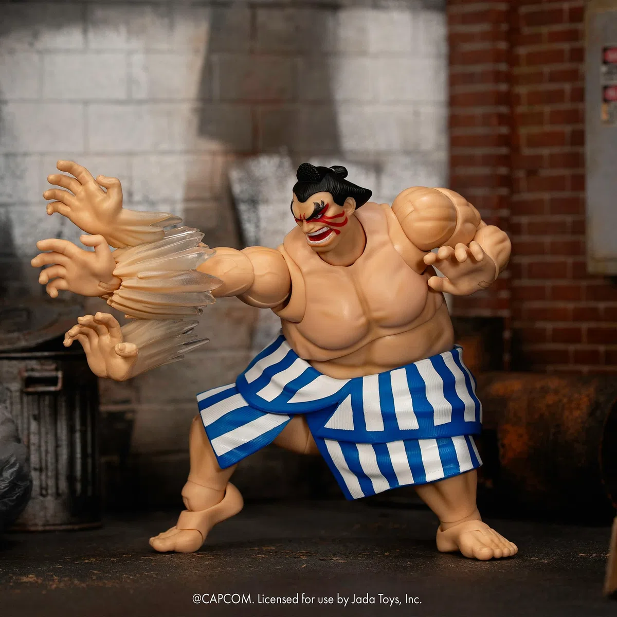 Jada Toys Street Fighter Figur E. Honda (16 cm) - bewegliche Sammel- und Actionfigur aus Street Fighter 2: The Final Challengers, mit alternativem Kopf, Händen und Zubehör, ab 13 Jahre