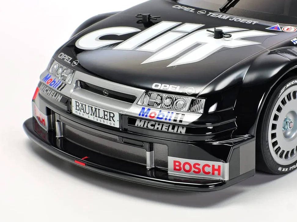 Tamiya 58701 1:10 RC Opel Calibra V6 Cliff (TT-01E) - ferngesteuertes Auto, RC Fahrzeug, Modellbau, Bausatz zum Zusammenbauen, Hobby, Basteln