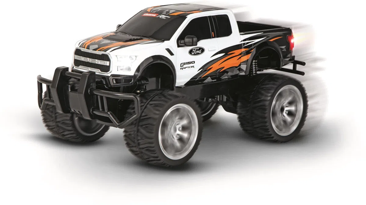 Carrera - 370142042 RC Ford F-150 Raptor I Ferngesteuerter RC Truck I Für Kinder & Erwachsenen I wiederaufladbar Batterie für 40 Minuten Fahrspaß I 18 km/h I Für Anfänger & Profis I 2,4 GHz